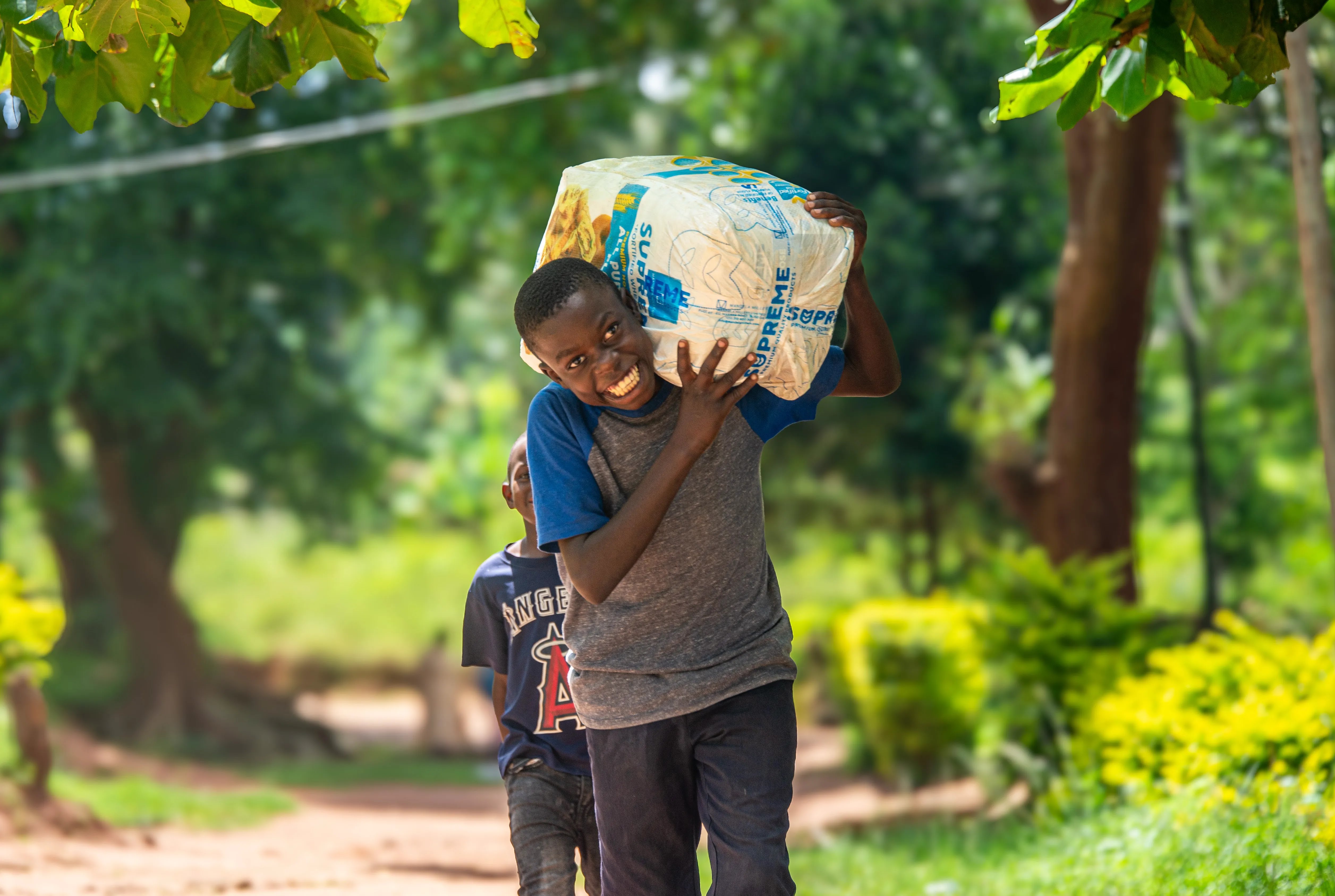 Africa Renewal Ministries Child Holding Gift Smiling